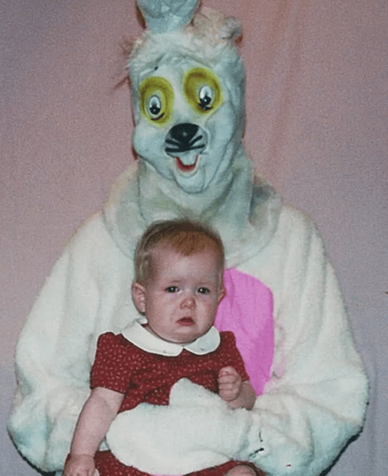 blue easter bunny with crying girl
